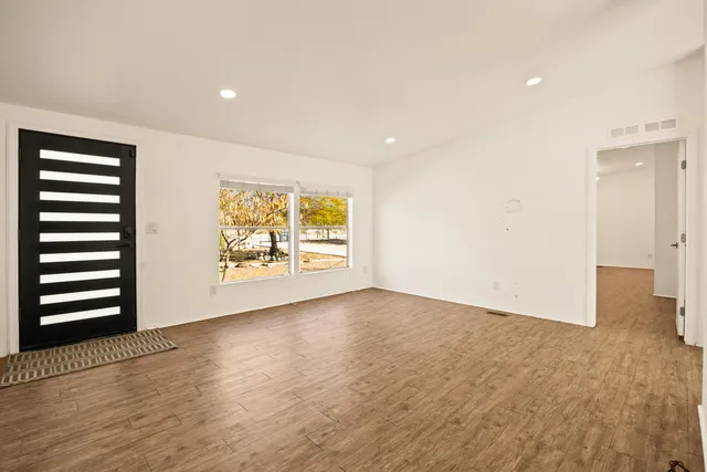 an empty room with windows