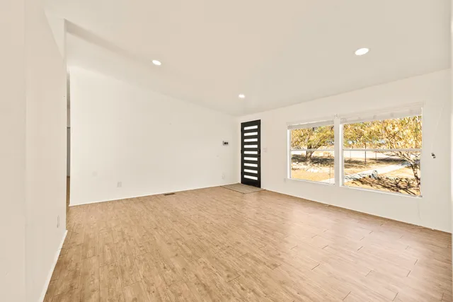 an empty room with windows