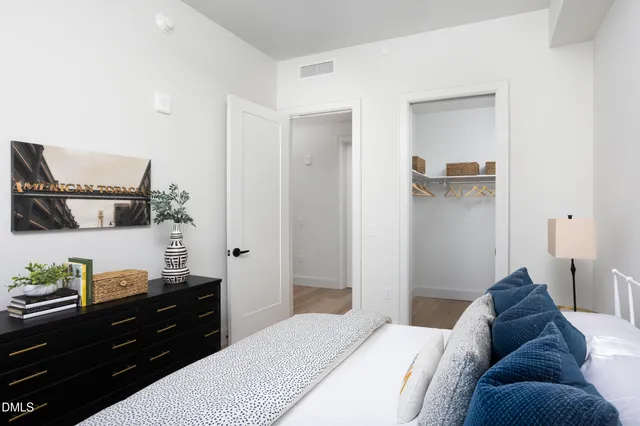 a balcony with an outdoor seating