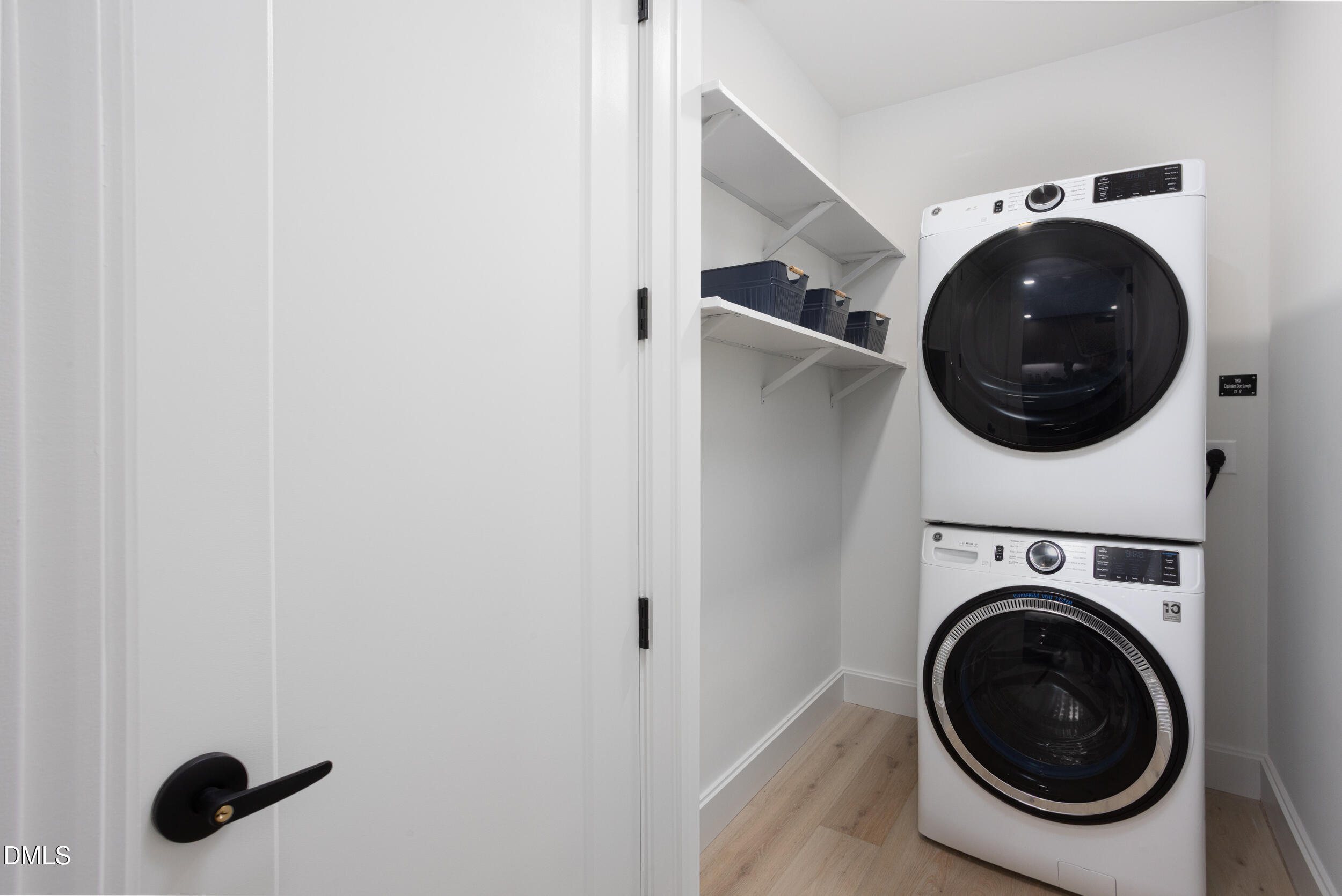 115 Morris Street, Unit 1903 Durham, NC 27701 - Photo 27 of 68 a view of a hallway with washer and dryer