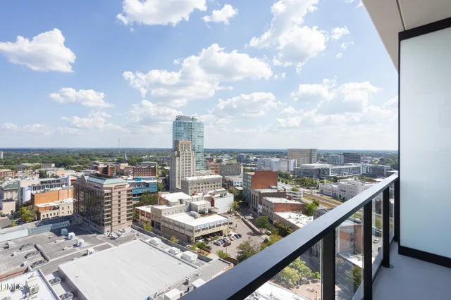 a view of a city with tall buildings