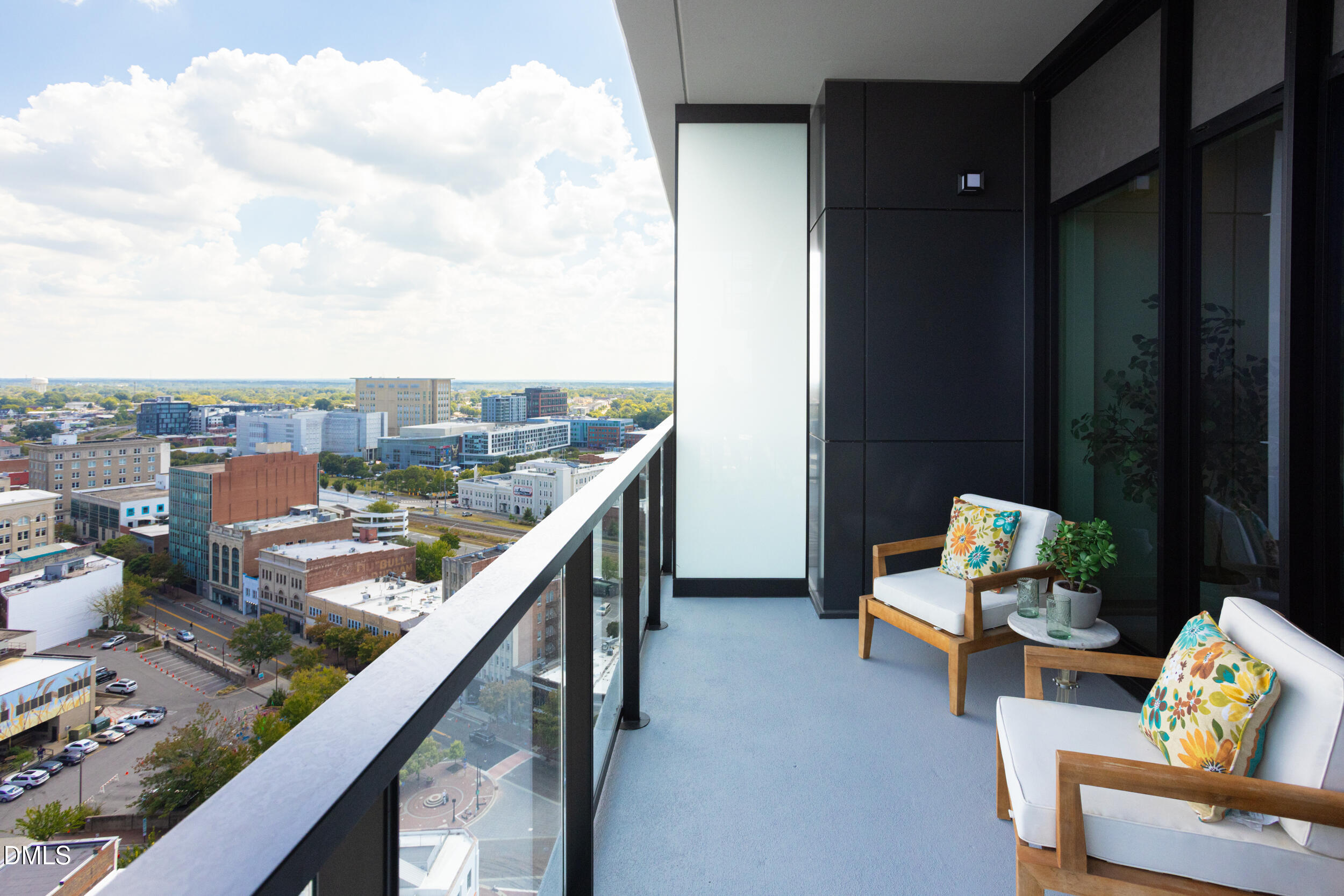 115 Morris Street, Unit 1903 Durham, NC 27701 - Photo 31 of 68 a balcony with an outdoor seating