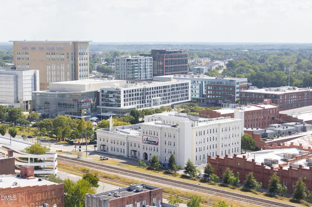 a view of a city with tall buildings