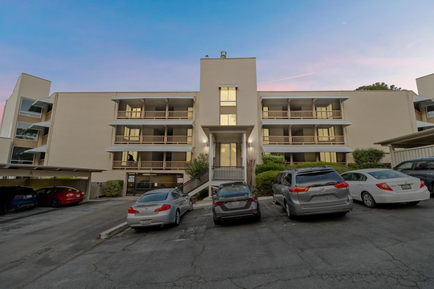 340 Vallejo Drive, Unit 53 Millbrae, CA 94030 - Photo 1 of 50 a car parked in front of a building