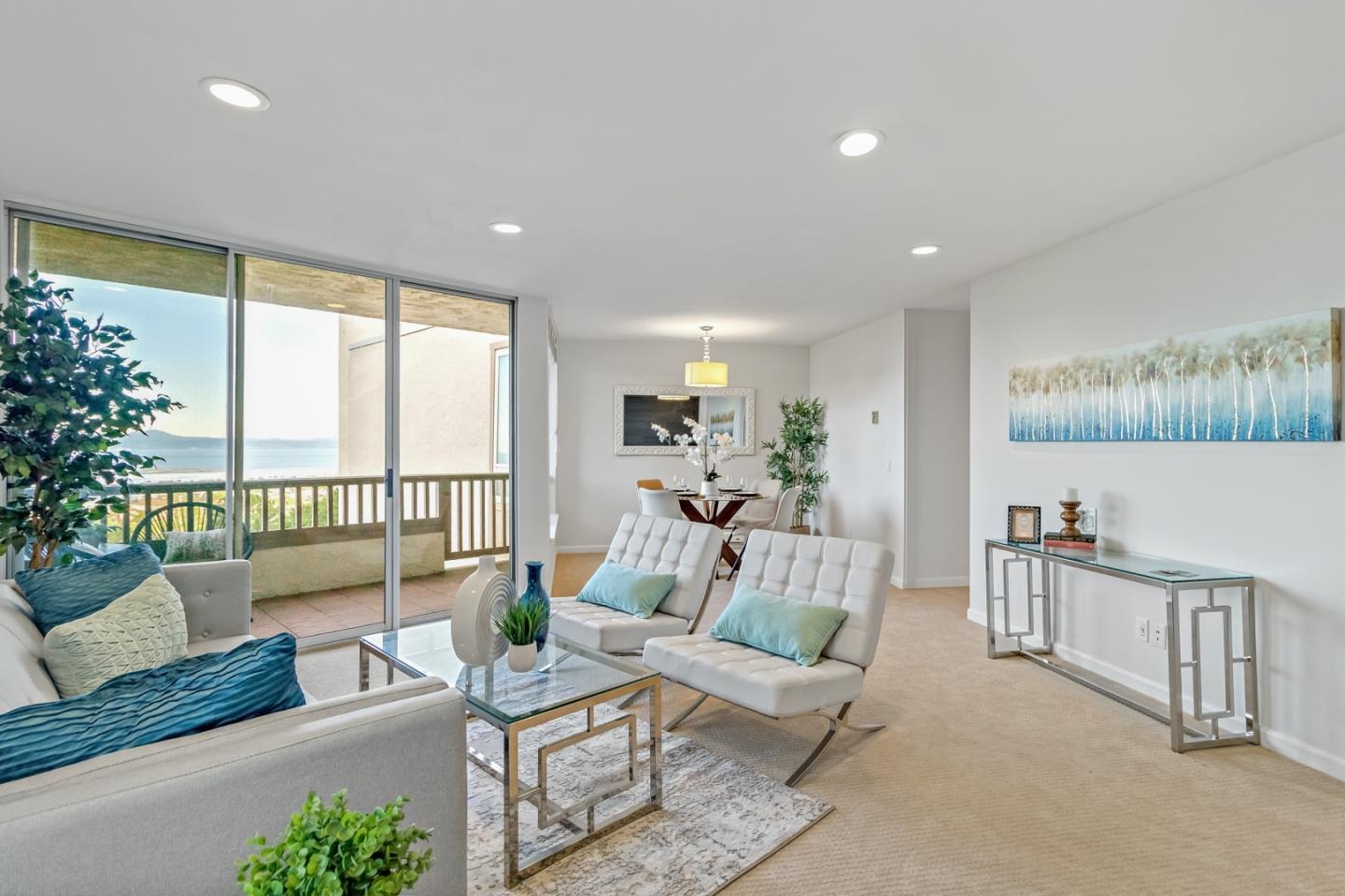 340 Vallejo Drive, Unit 53 Millbrae, CA 94030 - Photo 11 of 50 a living room with furniture and a large window