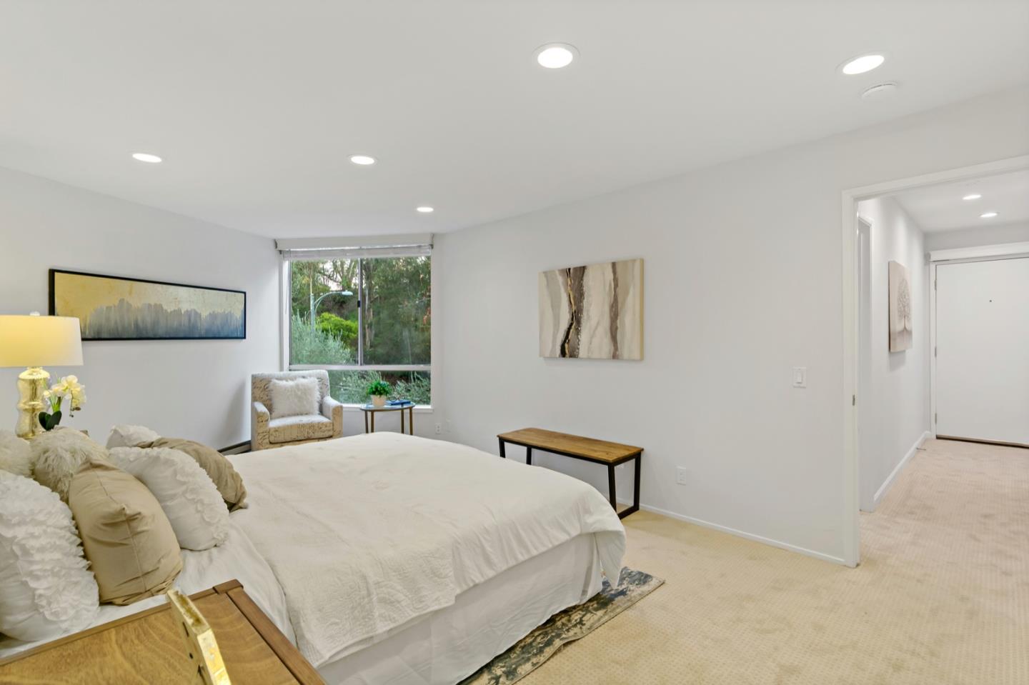 340 Vallejo Drive, Unit 53 Millbrae, CA 94030 - Photo 32 of 50 a bedroom with a bed and a large window