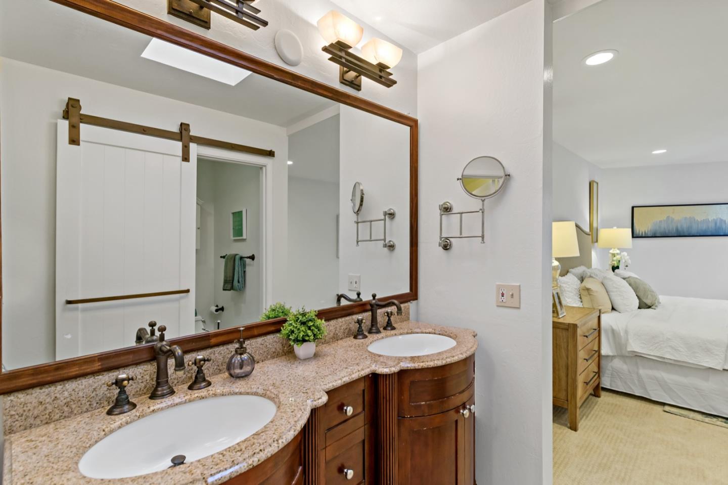 340 Vallejo Drive, Unit 53 Millbrae, CA 94030 - Photo 34 of 50 a bathroom with a sink double vanity and a mirror