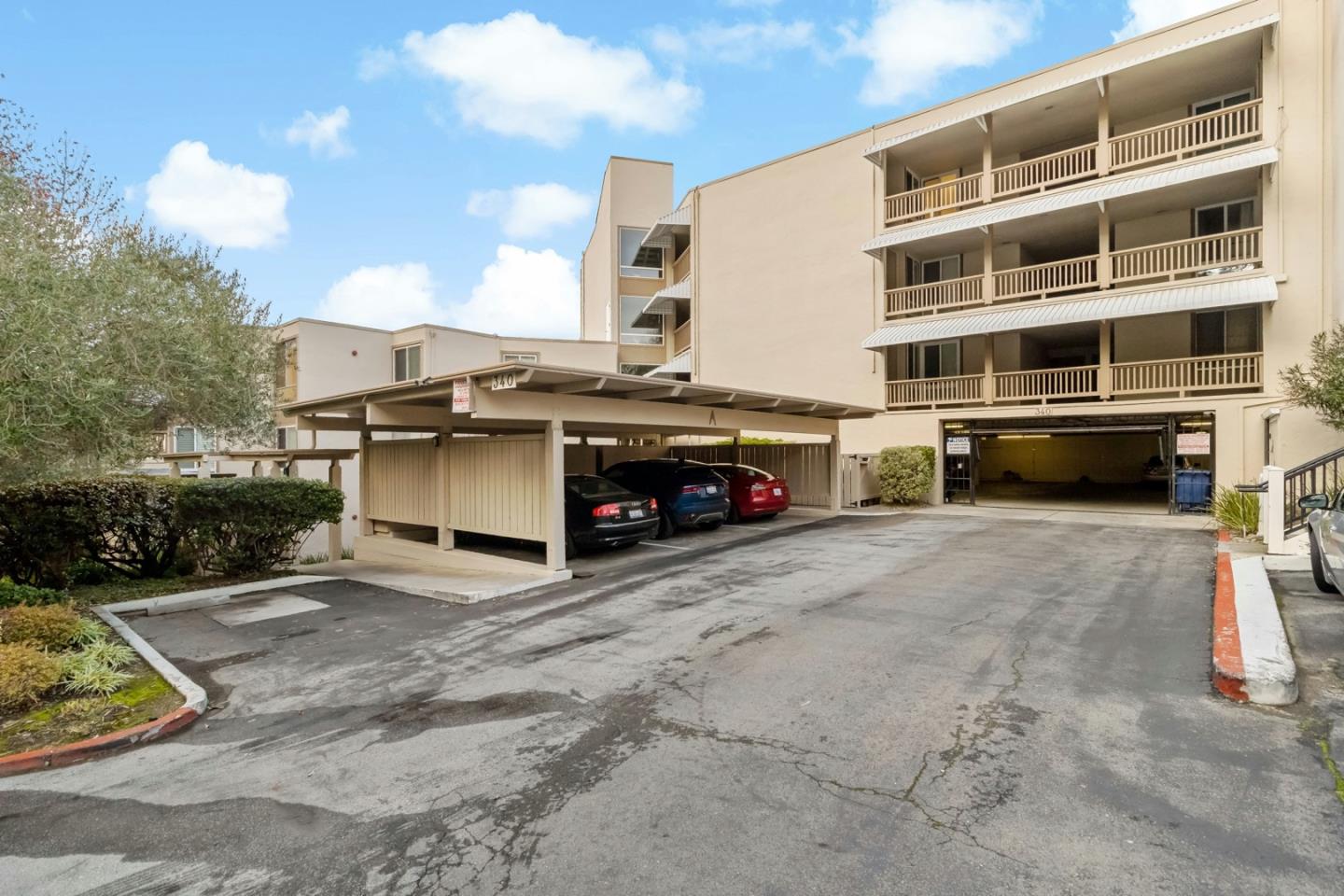 340 Vallejo Drive, Unit 53 Millbrae, CA 94030 - Photo 46 of 50 a car parked in front of a building