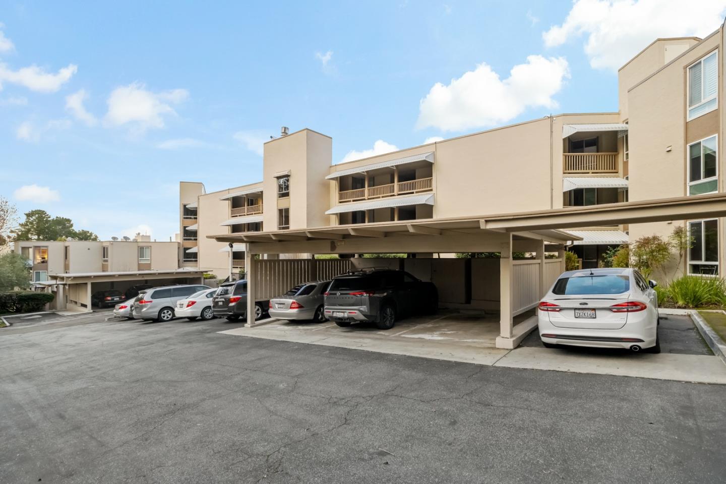 340 Vallejo Drive, Unit 53 Millbrae, CA 94030 - Photo 49 of 50 a car parked in front of a building