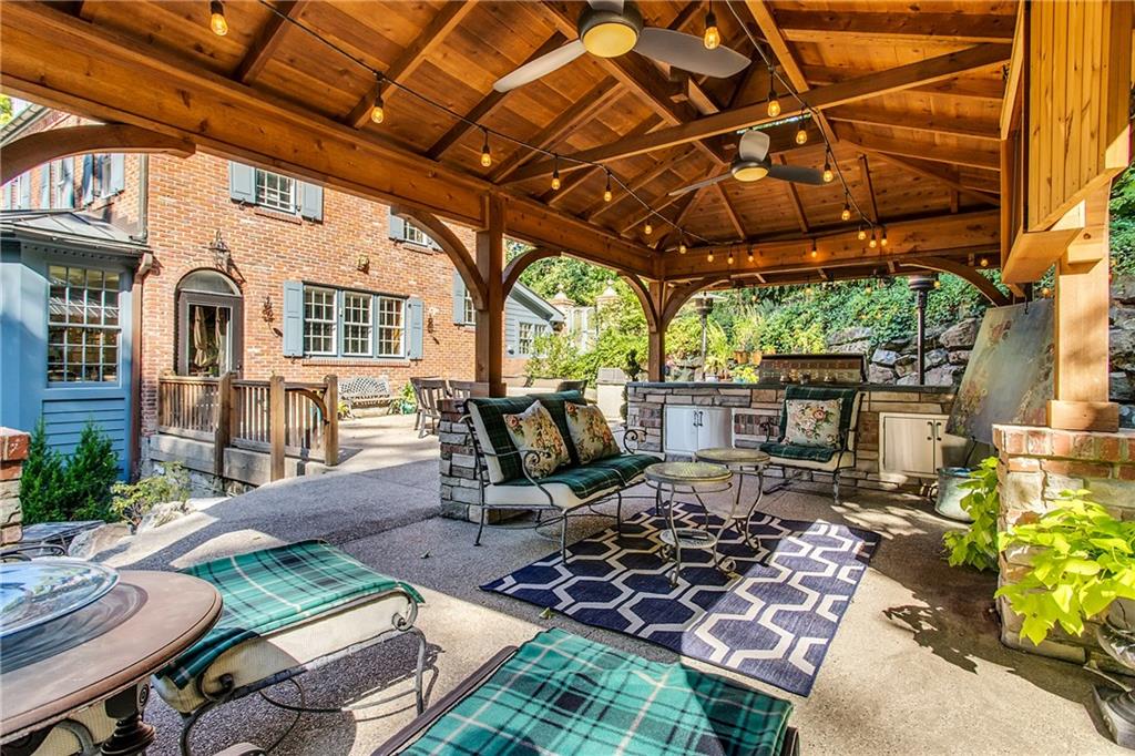 95 Woodland Road Pittsburgh, PA 15232 - Photo 21 of 25 The awesome pavilion leads to the patio, which provides additional space for dining and lounging. Easy access to the kitchen, or down to the lower yard, which features a fenced-in area, perfect for small children and/or pets!