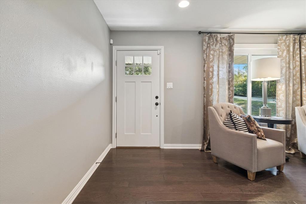 312 Old Justin Road Argyle, TX 76226 - Photo 2 of 24 a living room with furniture and a window