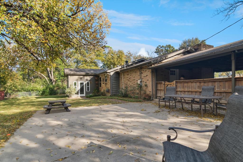312 Old Justin Road Argyle, TX 76226 - Photo 22 of 24 a view of a backyard with sitting area