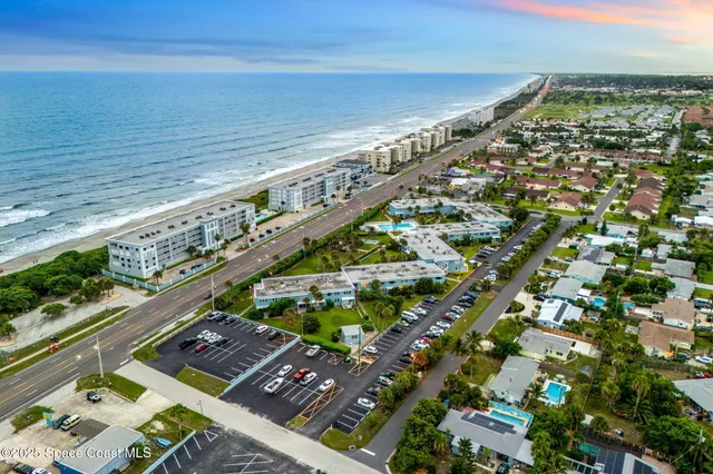 a large body of water with a large building