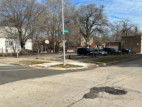 a view of street with houses