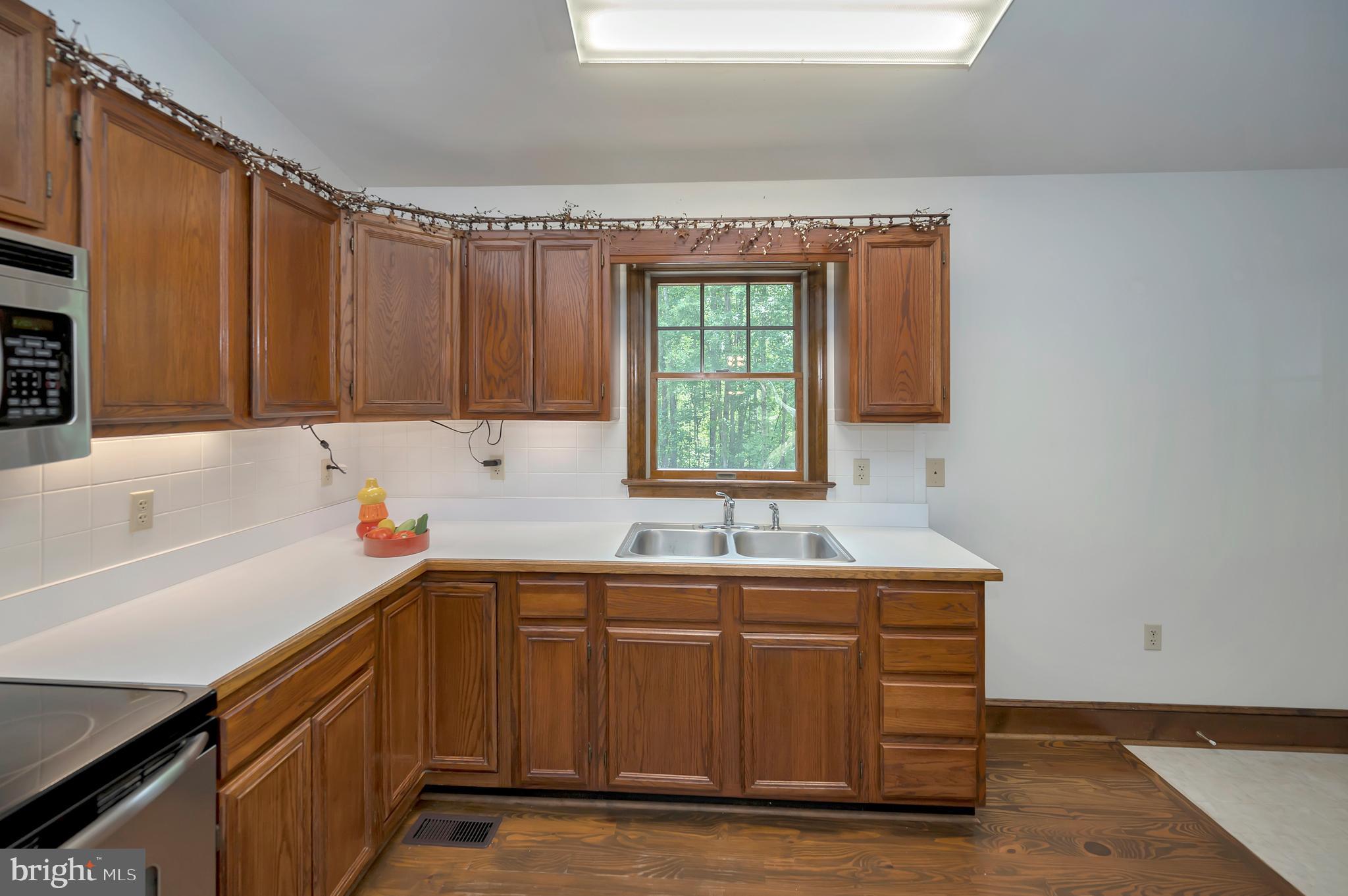 10165 Meadows Road Locust Grove, VA 22508 - Photo 13 of 52 kitchen window overlooks backyard