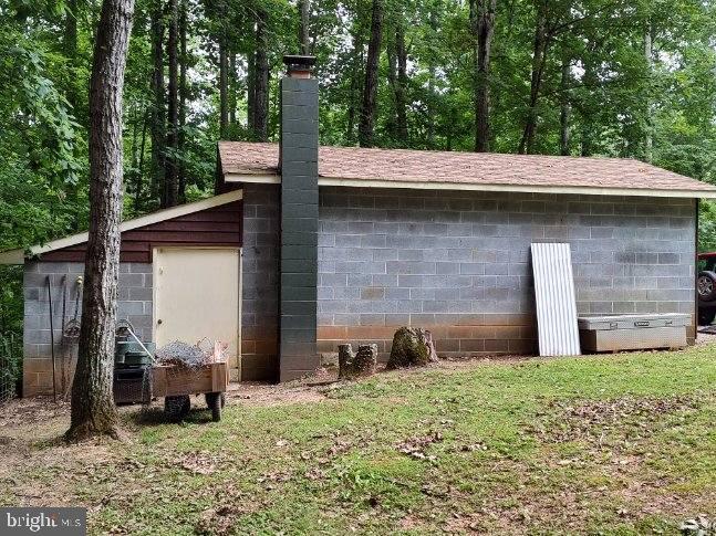 10165 Meadows Road Locust Grove, VA 22508 - Photo 46 of 52 side of garage with access to storage/office
