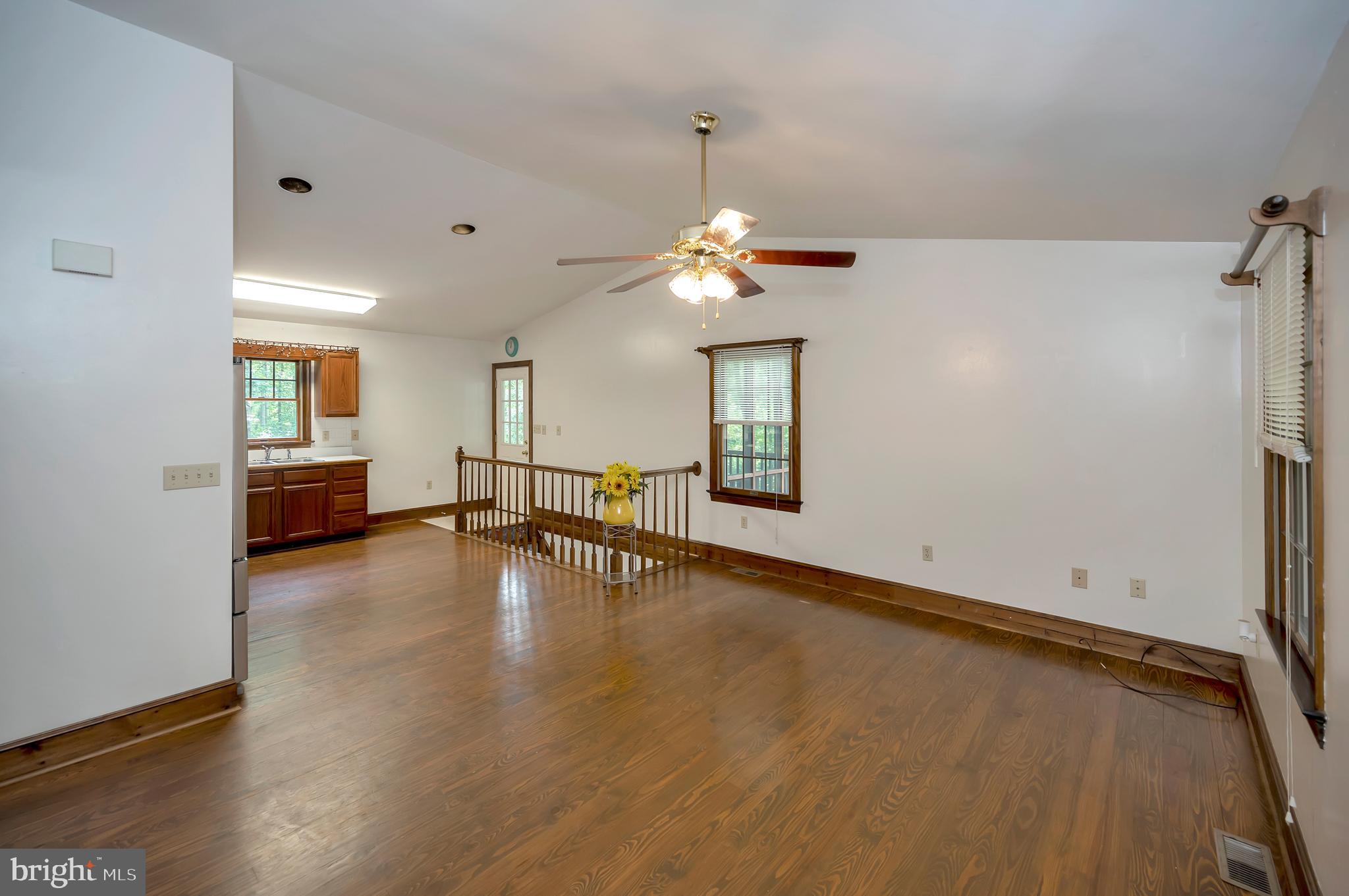 10165 Meadows Road Locust Grove, VA 22508 - Photo 6 of 52 Living Room view to screen porch & kit