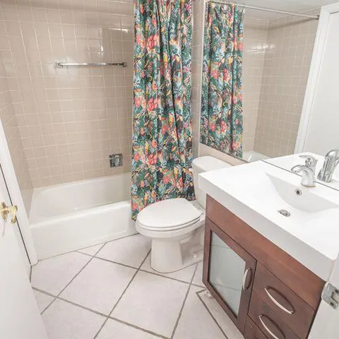 a bathroom with a sink a toilet and a bathtub