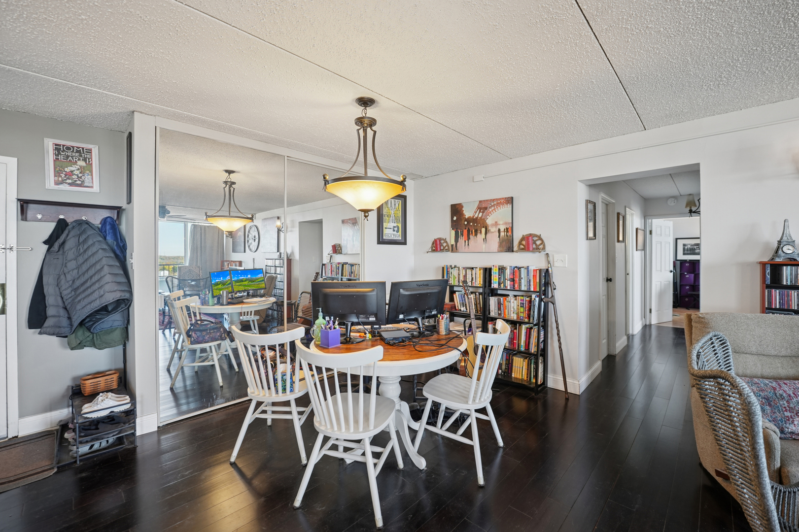 2005 South Finley Road, Unit 1202 Lombard, IL 60148 - Photo 11 of 29 a dining room with furniture and wooden floor