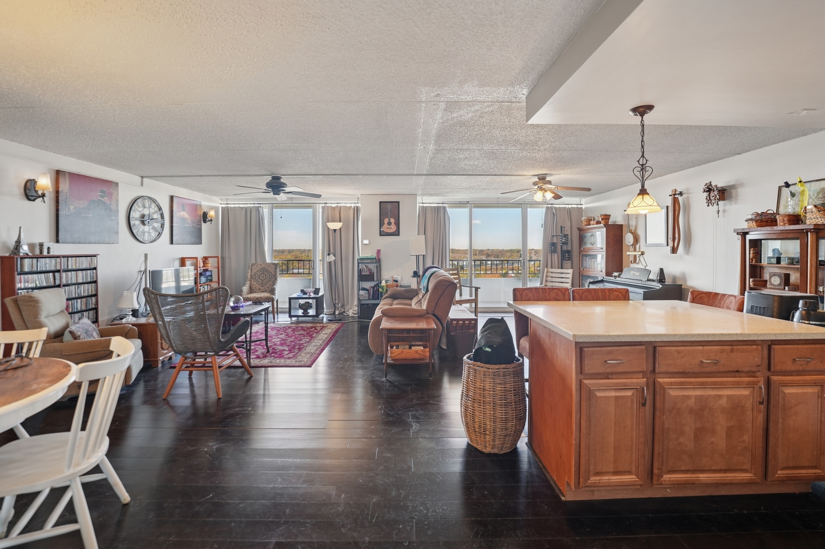 2005 South Finley Road, Unit 1202 Lombard, IL 60148 - Photo 13 of 29 a living room with lots of furniture and kitchen view
