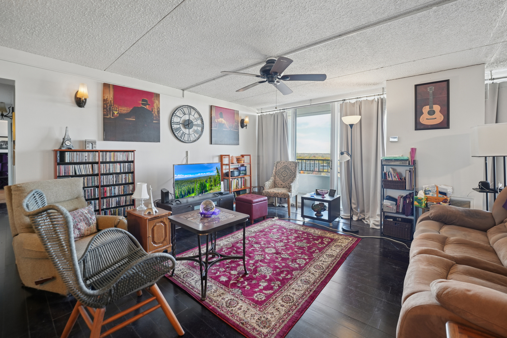 2005 South Finley Road, Unit 1202 Lombard, IL 60148 - Photo 16 of 29 a living room with furniture and a rug