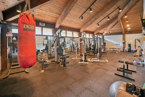 a view of a room with gym equipment
