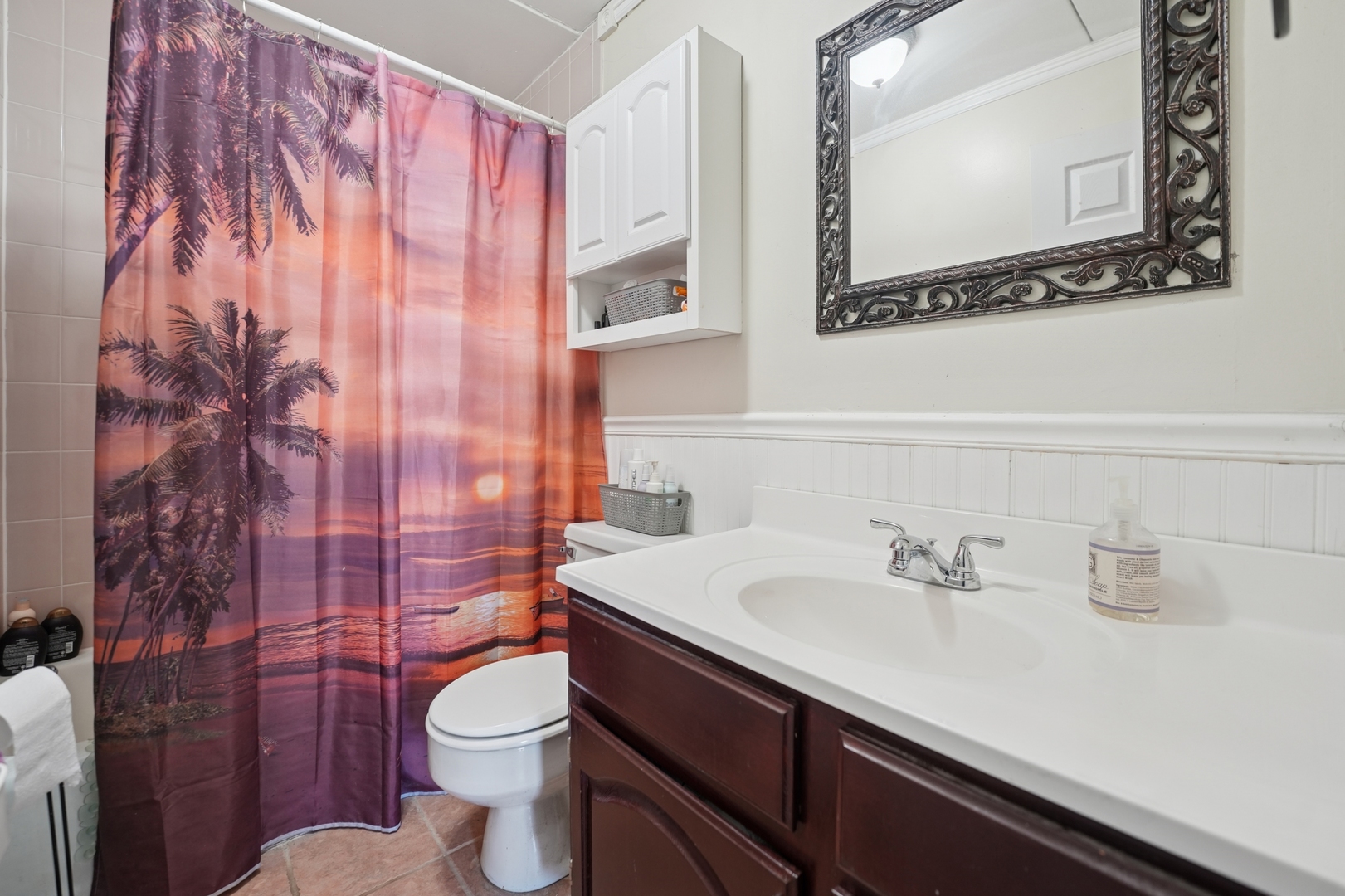 2005 South Finley Road, Unit 1202 Lombard, IL 60148 - Photo 10 of 29 a bathroom with a sink a toilet and shower curtain