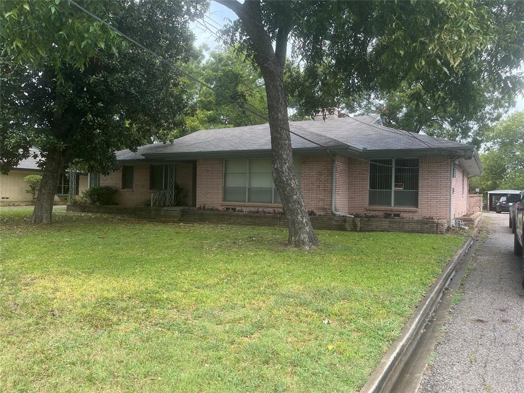 2931 Linfield Road Dallas, TX 75216 - Photo 1 of 1 Single story home featuring brick siding, a front lawn, and roof with shingles