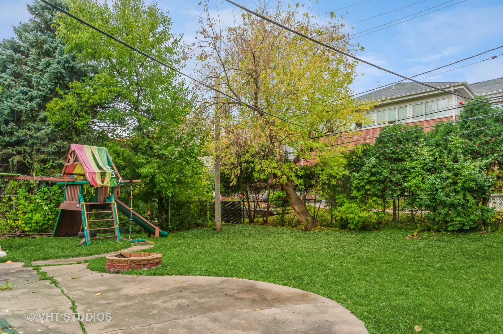 3700 Holly Lane Rolling Meadows, IL 60008 - Photo 13 of 13 a front view of a house with a yard and tree s
