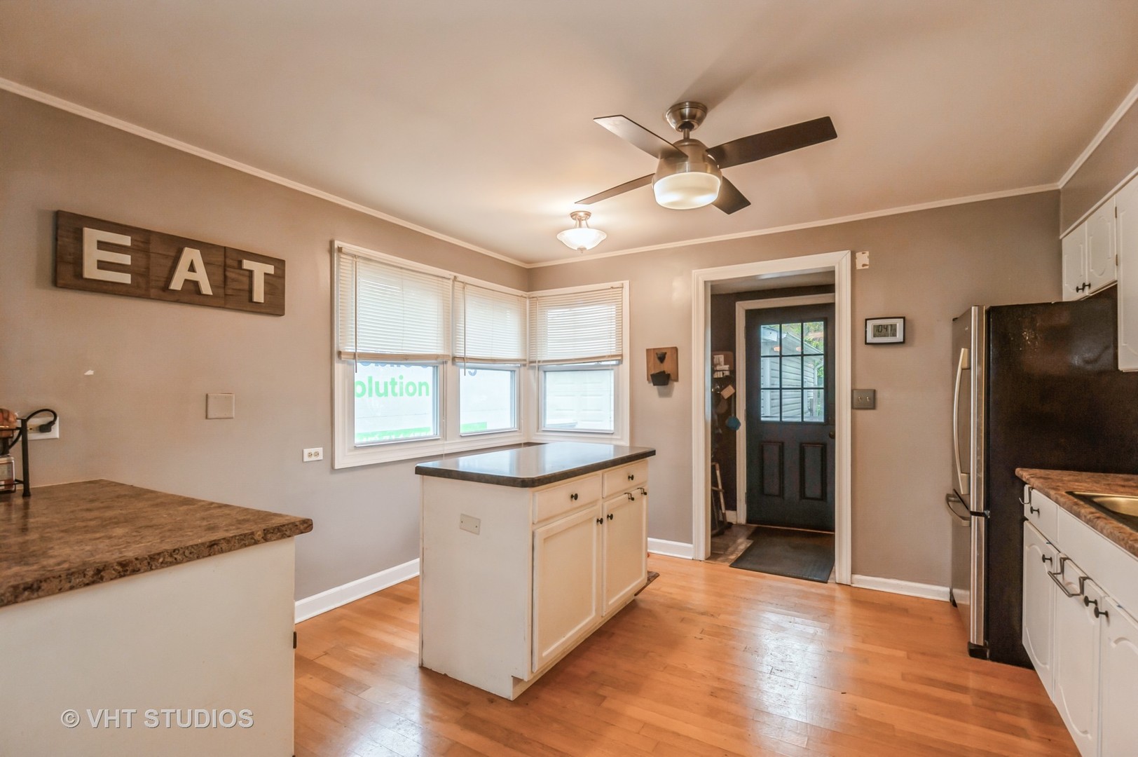 3700 Holly Lane Rolling Meadows, IL 60008 - Photo 4 of 13 a view of a kitchen cabinets and wooden floor