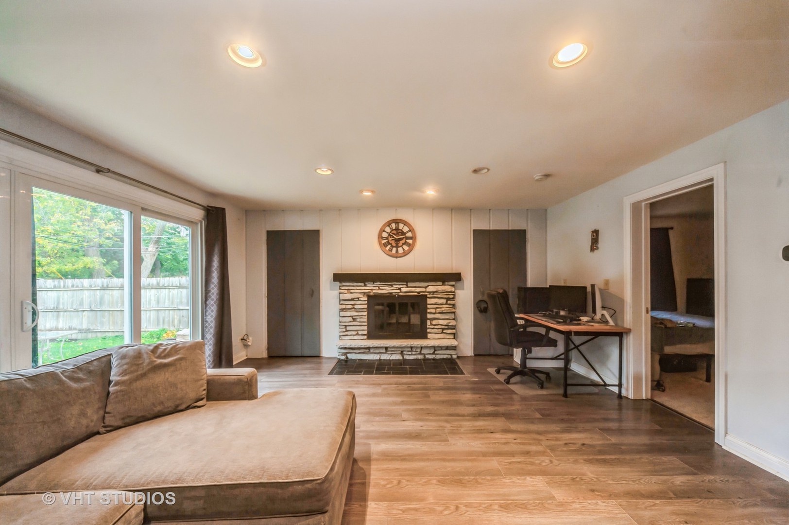 3700 Holly Lane Rolling Meadows, IL 60008 - Photo 7 of 13 a living room with furniture and a fireplace