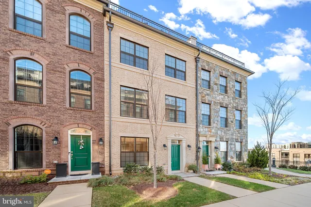 a front view of a multi story residential apartment building