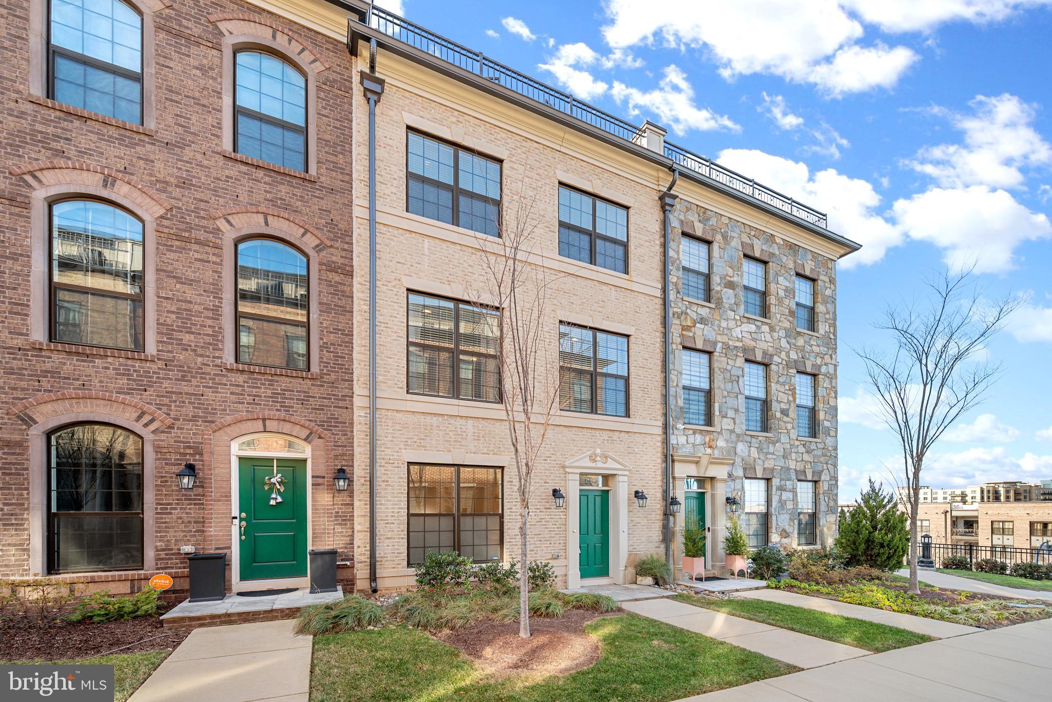 a front view of a multi story residential apartment building