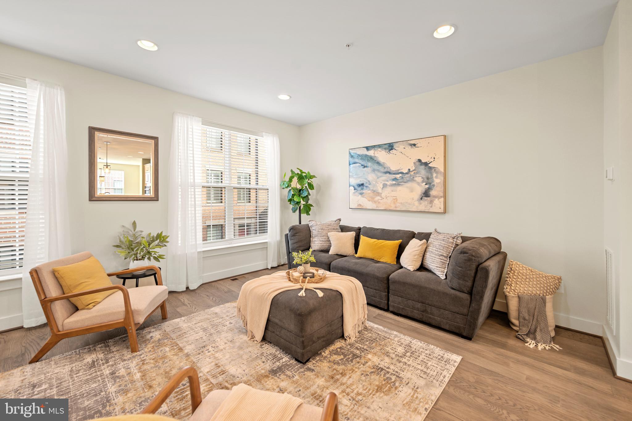 502 Windboard Way Oxon Hill, MD 20745 - Photo 12 of 54 a bedroom with furniture and a large window