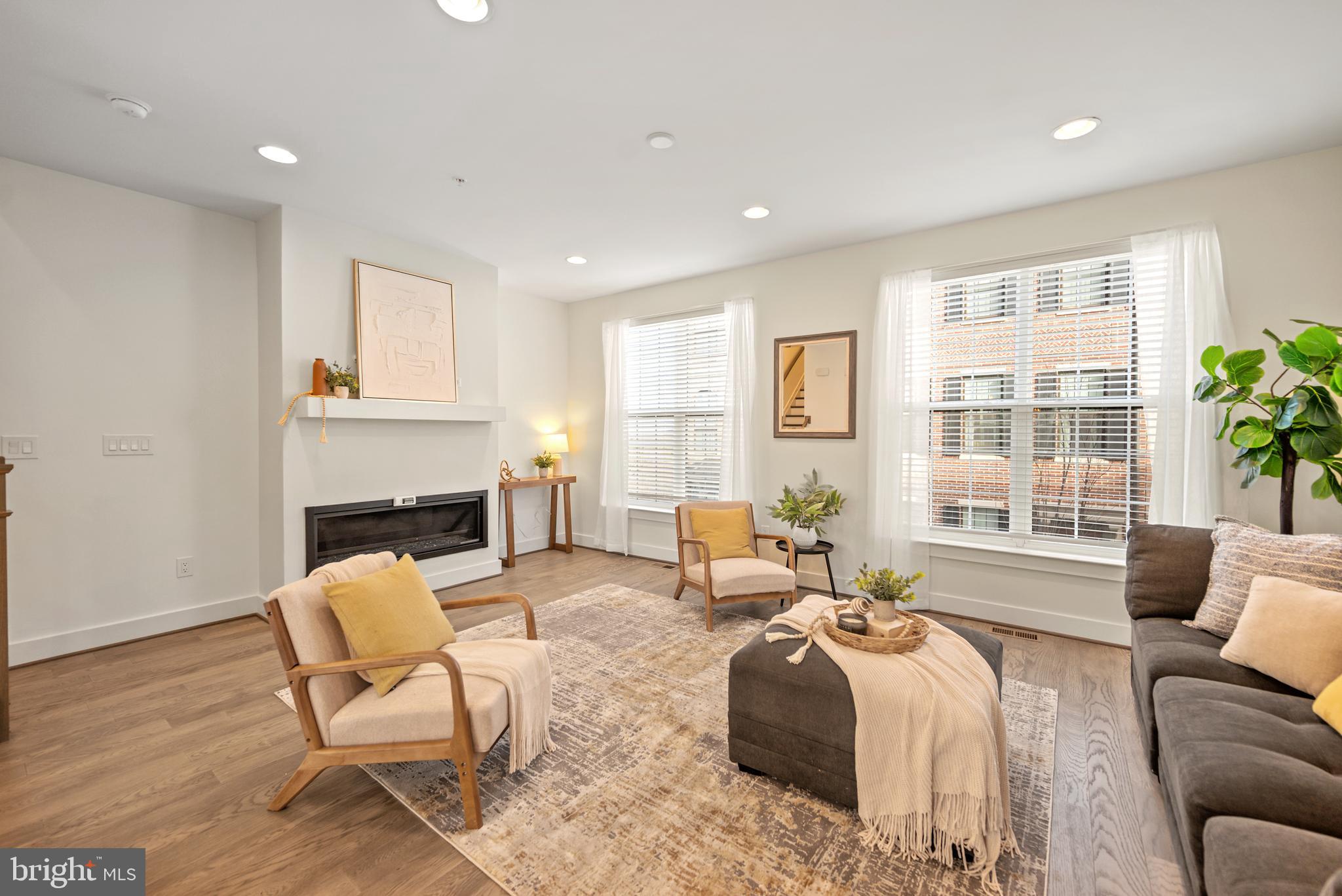 502 Windboard Way Oxon Hill, MD 20745 - Photo 13 of 54 a spacious bedroom with a bed and a couch