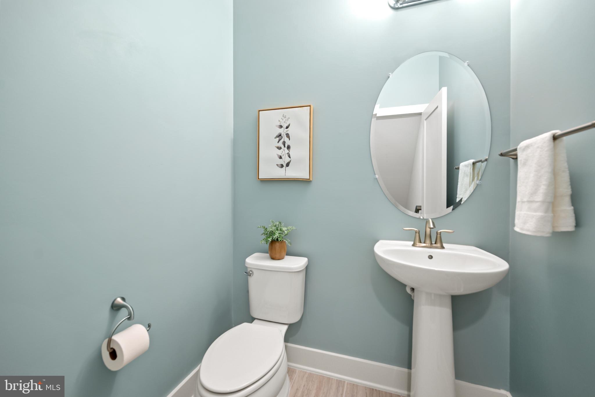502 Windboard Way Oxon Hill, MD 20745 - Photo 17 of 54 a bathroom with a sink mirror and toilet
