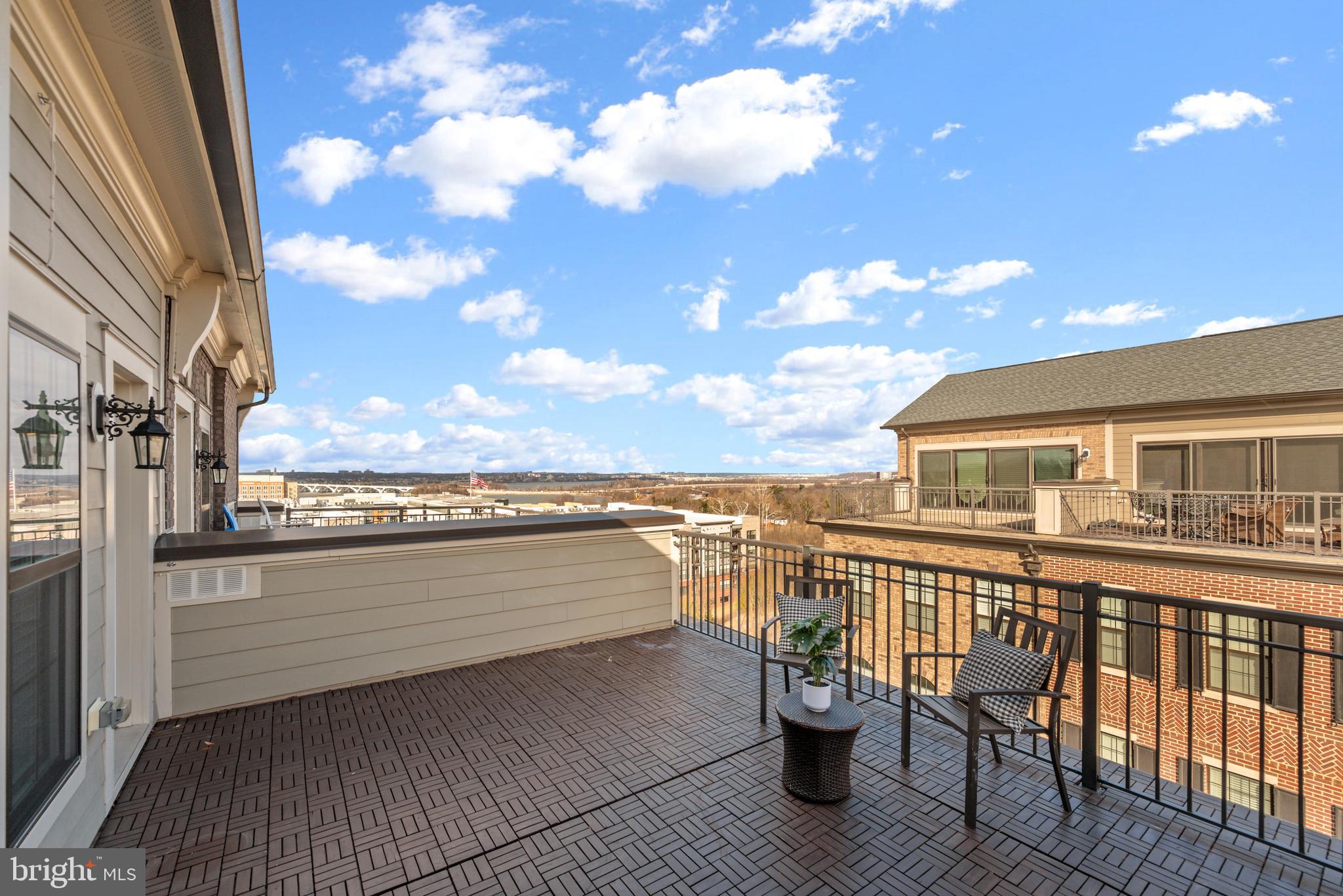 502 Windboard Way Oxon Hill, MD 20745 - Photo 33 of 54 a view of a balcony with wooden floor