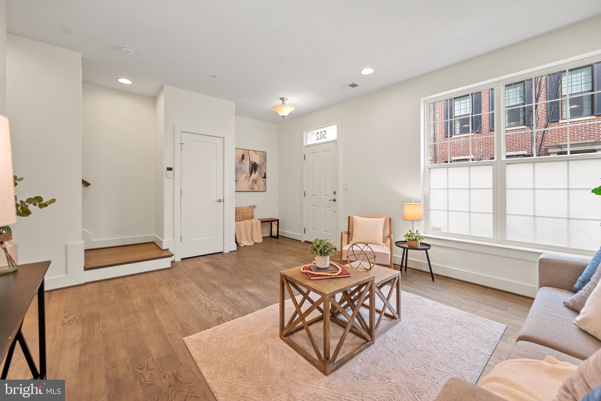 502 Windboard Way Oxon Hill, MD 20745 - Photo 43 of 54 a living room with furniture and a large window