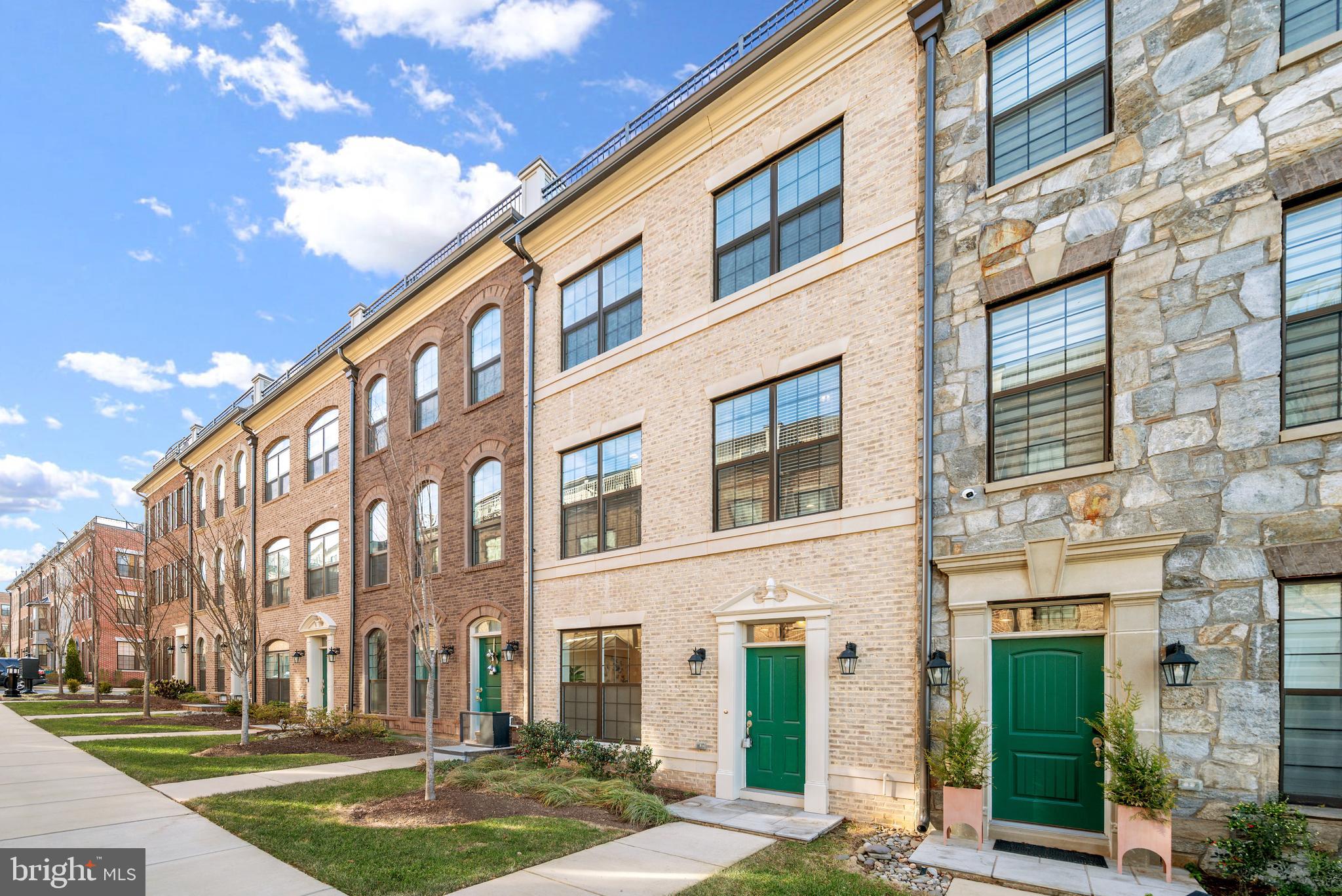 502 Windboard Way Oxon Hill, MD 20745 - Photo 46 of 54 a large building with a yard in front of it