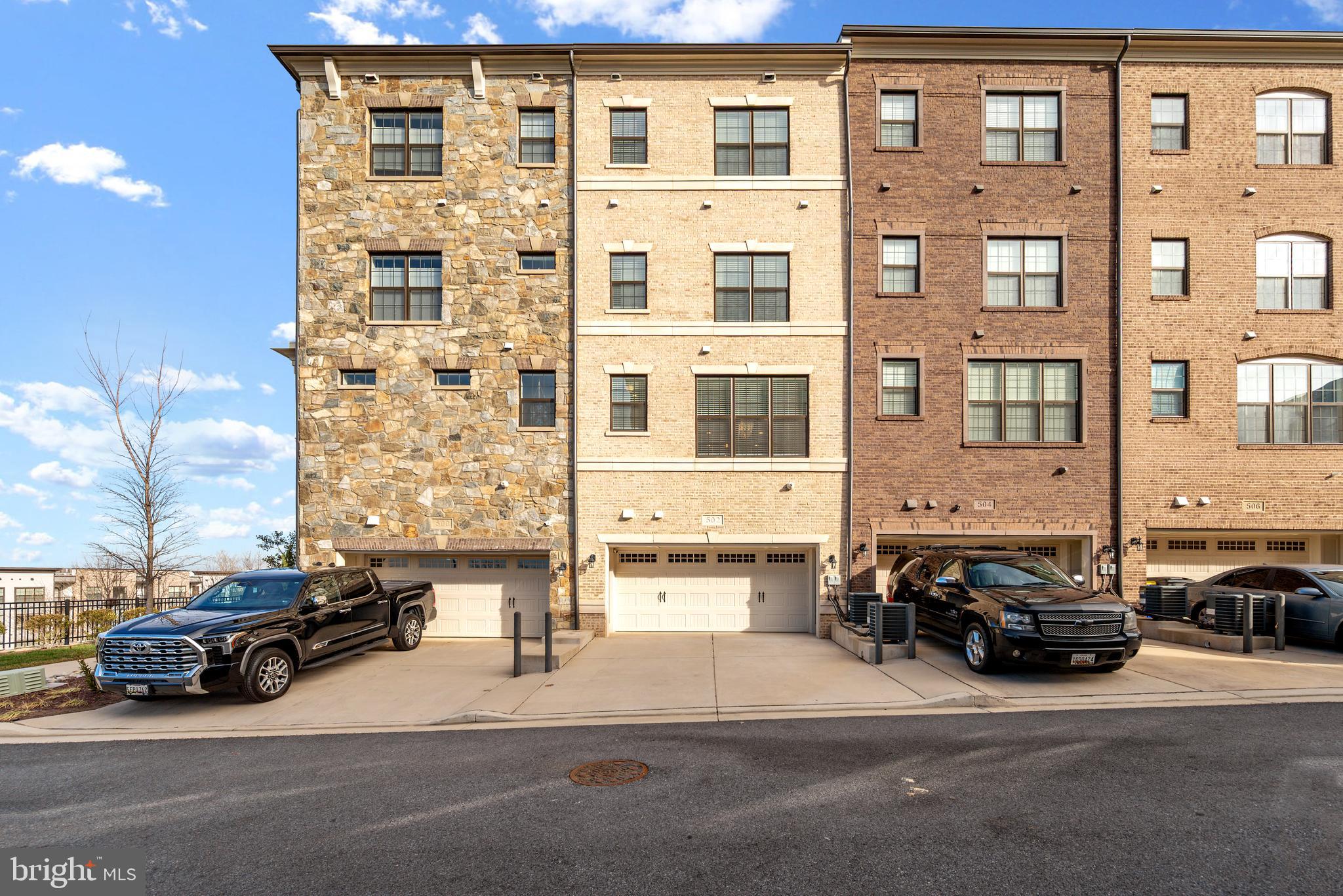 502 Windboard Way Oxon Hill, MD 20745 - Photo 48 of 54 a view of a cars parked in front of a building