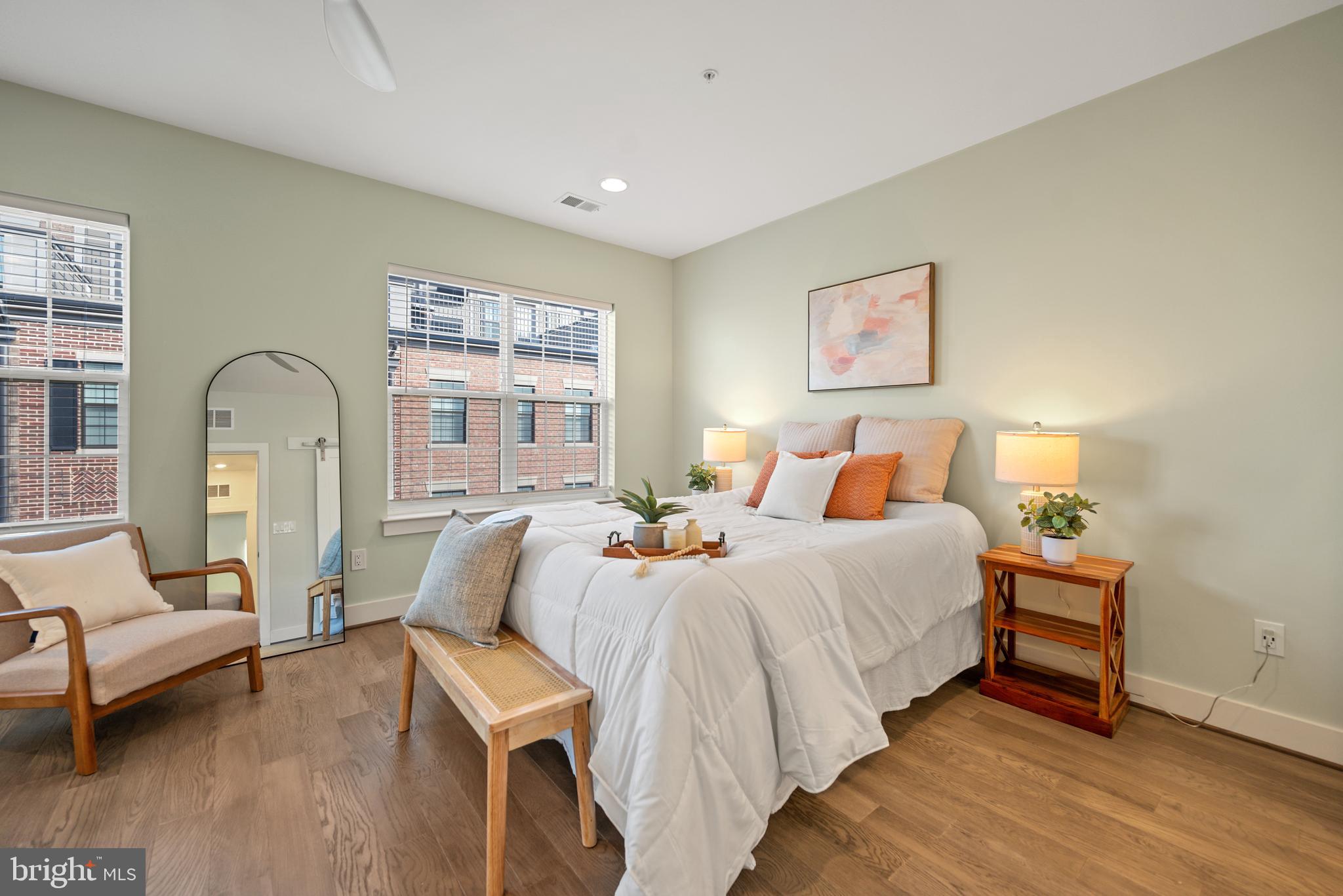 502 Windboard Way Oxon Hill, MD 20745 - Photo 5 of 54 a bedroom with bed and a large window