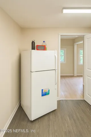 a view of kitchen with a fridge