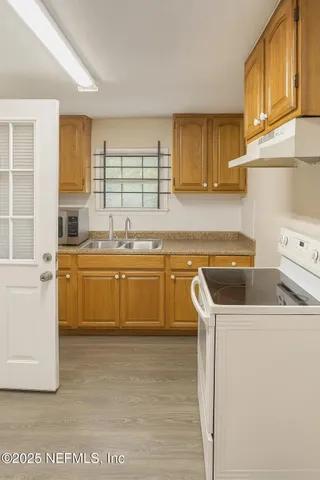 a utility room with washer and dryer