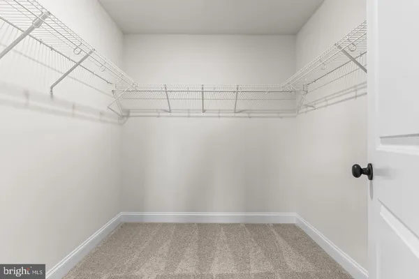 a view of a room with racks on the wall