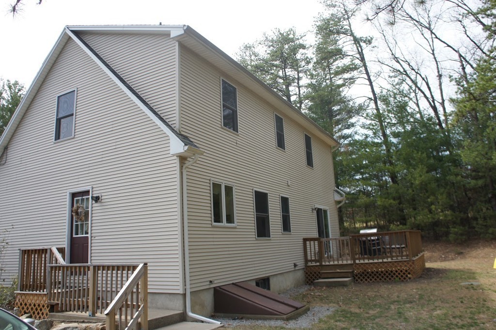 176 Palmer Road Brimfield, MA 01010 - Photo 3 of 17 a view of house with a tree beside it