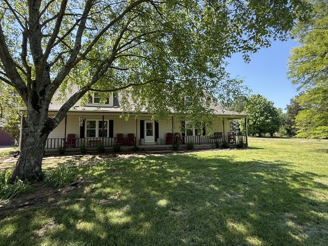 6241 Wards Mill Road Marion, IL 62959 - Photo 21 of 29 a front view of a house with a garden