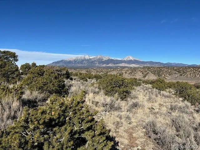 a view of mountain view with mountains in the background