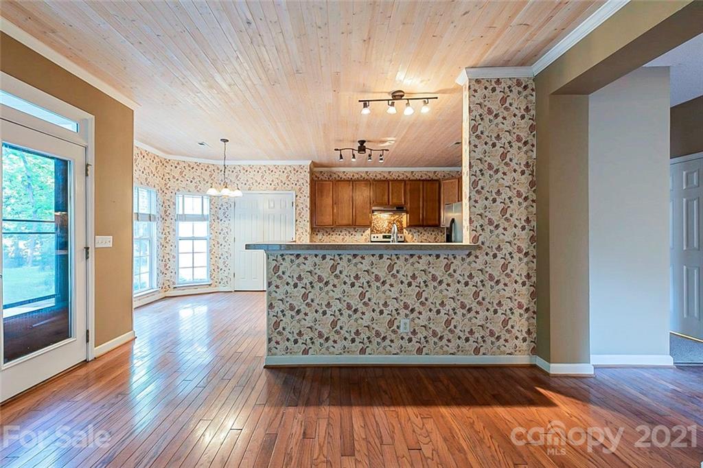 871 Knightsbridge Road Fort Mill, SC 29708 - Photo 8 of 19 a view of a room with wooden floor and staircase
