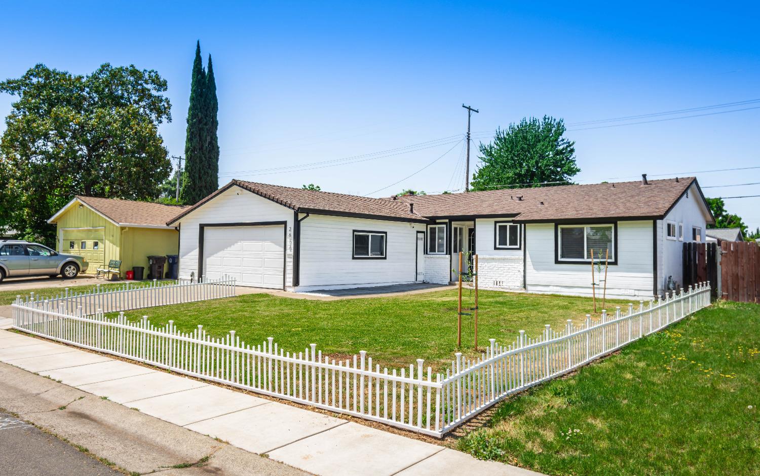 2672 Ellenbrook Drive Rancho Cordova, CA 95670 - Photo 1 of 1 a front view of a house with a yard