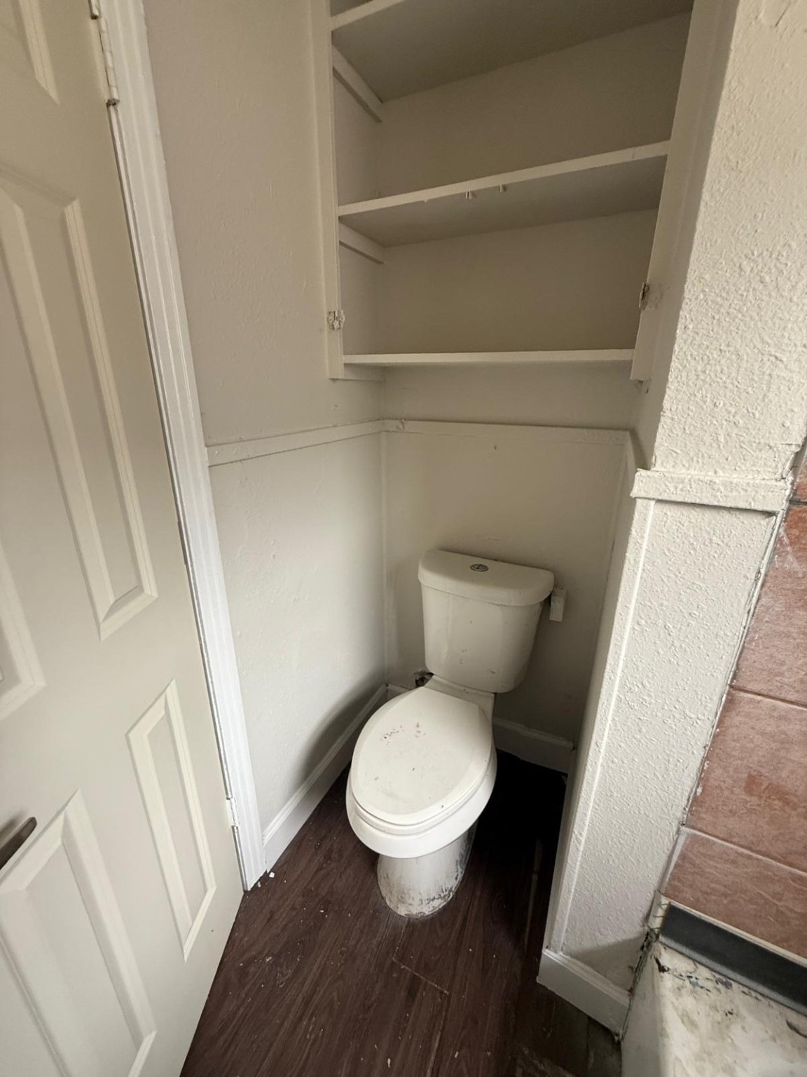 2238 Hutton Street Houston, TX 77026 - Photo 6 of 10 a white toilet sitting next to a sink